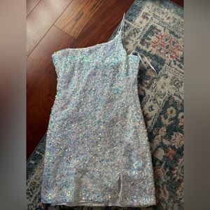 A mini dress covered in sequins